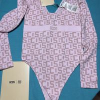 Wolford body senza cucire- colore rosa crema- nuovo-M/L