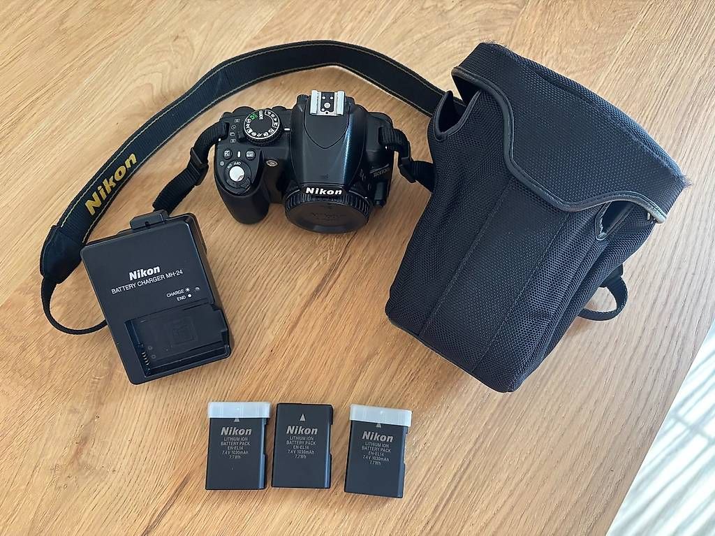 Nikon Fotocamera: Nikon D3100 reflex numérique + 3 batteries + chargeur – Usato da Courtepin venduto da pflon 3