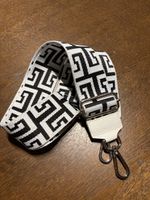 Taschenriemen gewebt schwarz weiss geometrisches Muster