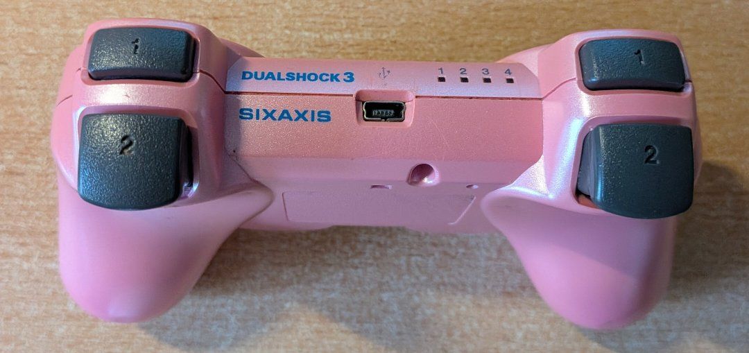 Sony Controller: Manette PS3 Sony Dualshock 3 Sixaxis Rose – Usato da Cernier venduto da Poussetofiol 1