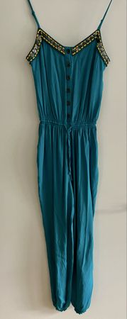 Wunderschöner Jumpsuit von Yessica in türkis, Grösse 36/38