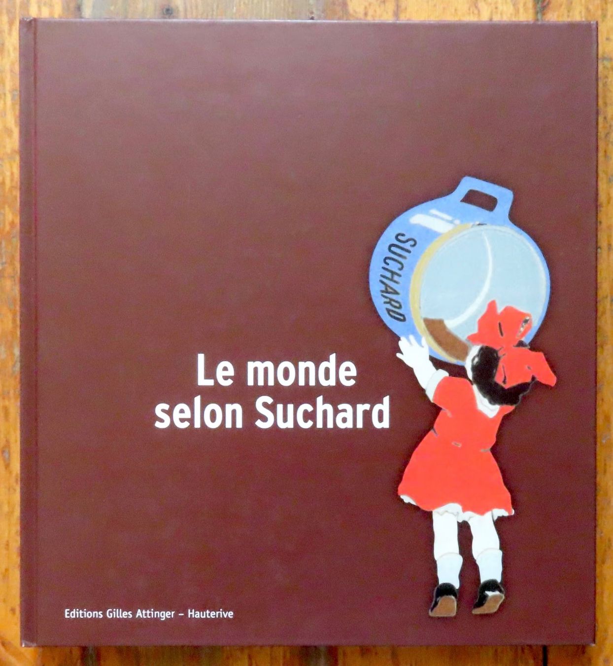 Livres: Le monde selon Suchard – D'occasion à Le Locle par LibrairieLaBergerie