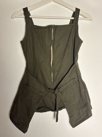 edgy vintage top with belt detail and pockets