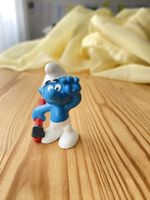 Schlumpf Handwerker mit Hammer