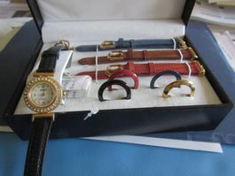 coffret neuf  4 montres en une