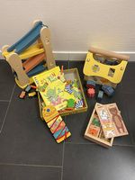 Diverse Holzspielzeuge und Spiele für Kleinkinder