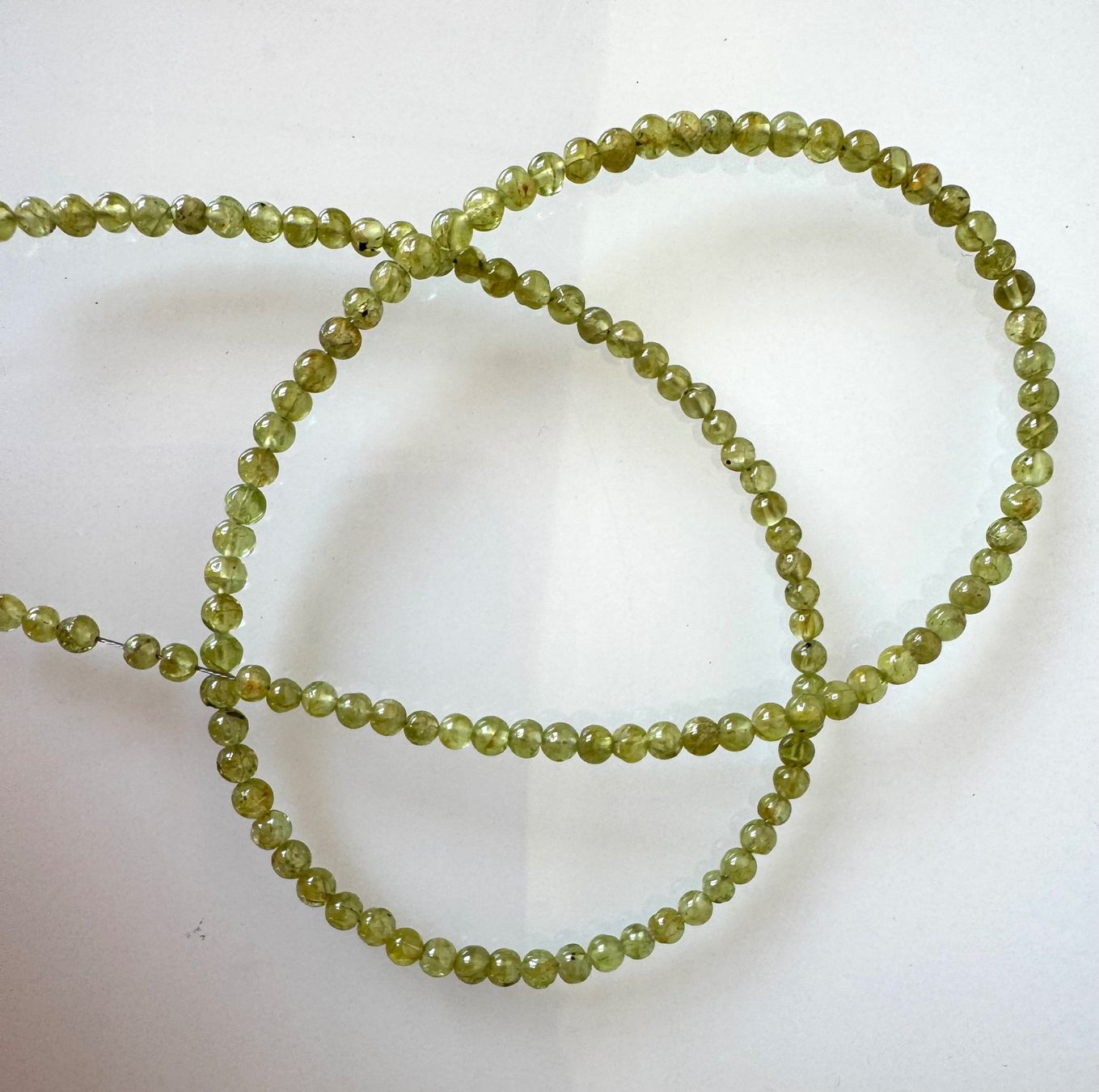 Ketten: Peridot. Olivin       runde Form    45cm  4mm – Neu und originalverpackt aus Leuggern von gemshow 3