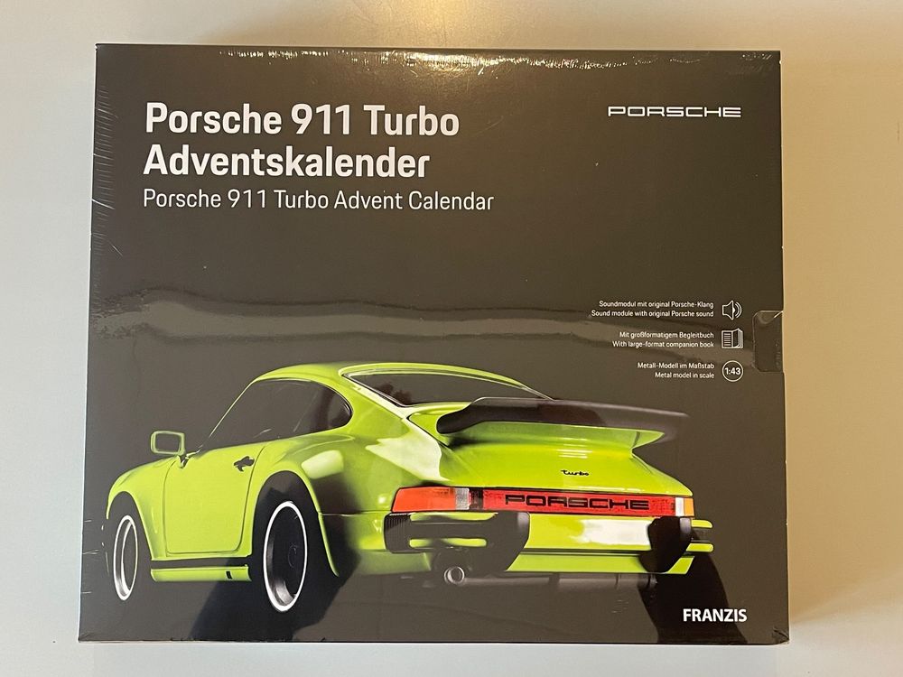 Franzis 67203 El calendario de adviento azul congelado Porsche Taycan, modelo de metal en escala 1:24, incluye iluminación LED de salón y un libro de 52 páginas... Porsche Calendario de Adviento