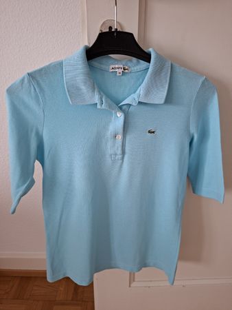 Polo Lacoste bleu taille 38 bon état