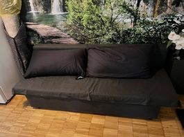 Schlafsofa dunkelgrau mit 2 Kissen und Decke