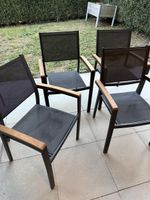 4 Stackable Garden Chairs Black Metal Wood Armrests
