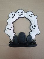 couronne d'halloween avec des fantômes 
