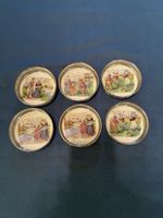 6 antike Porzellanuntersetzer mit Metallrand