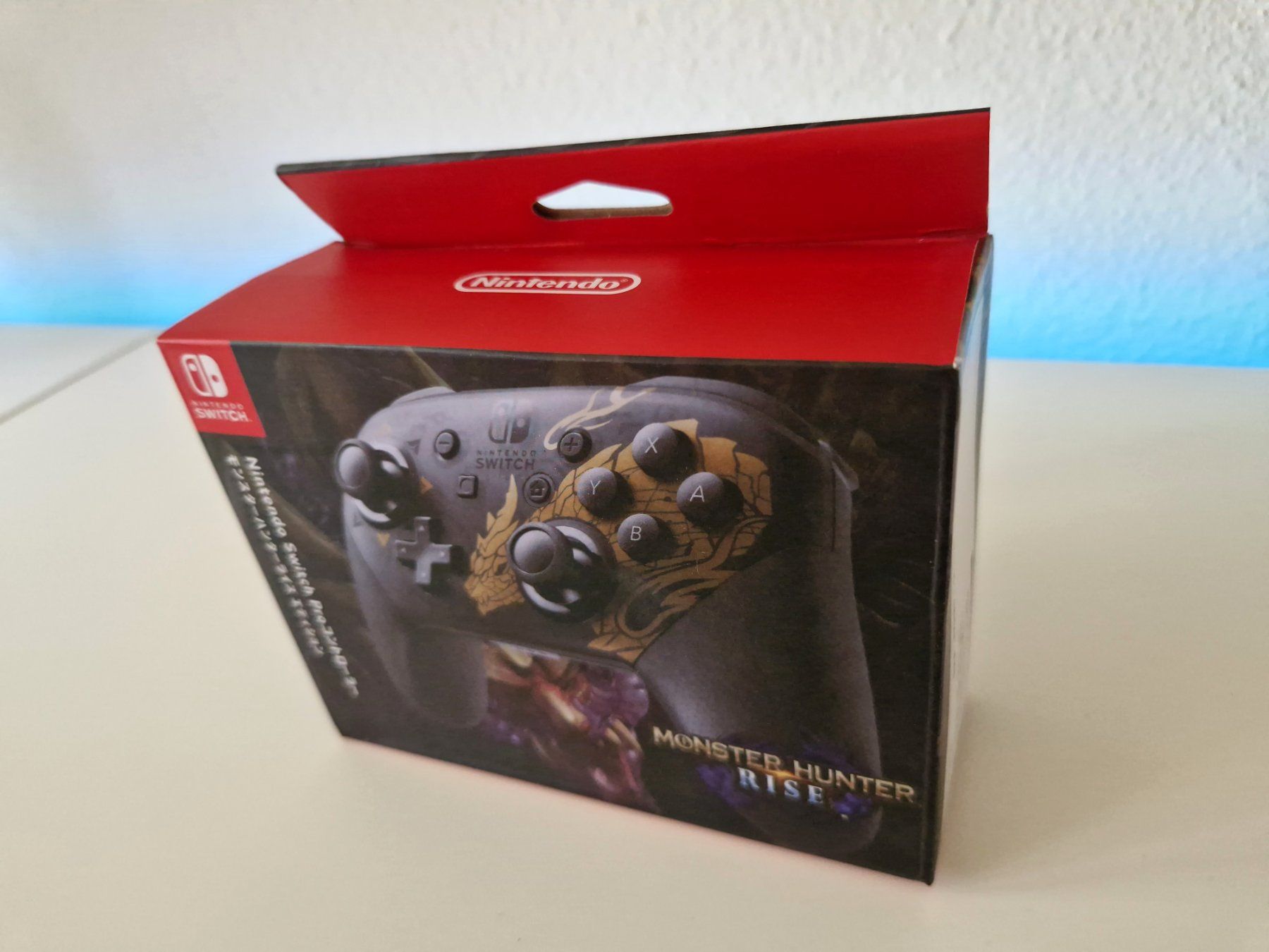 Nintendo Controller: Original NINTENDO Switch Pro Controller ( FABRIKNEU) MH Rise – Neu und originalverpackt aus Uster von -FPS-