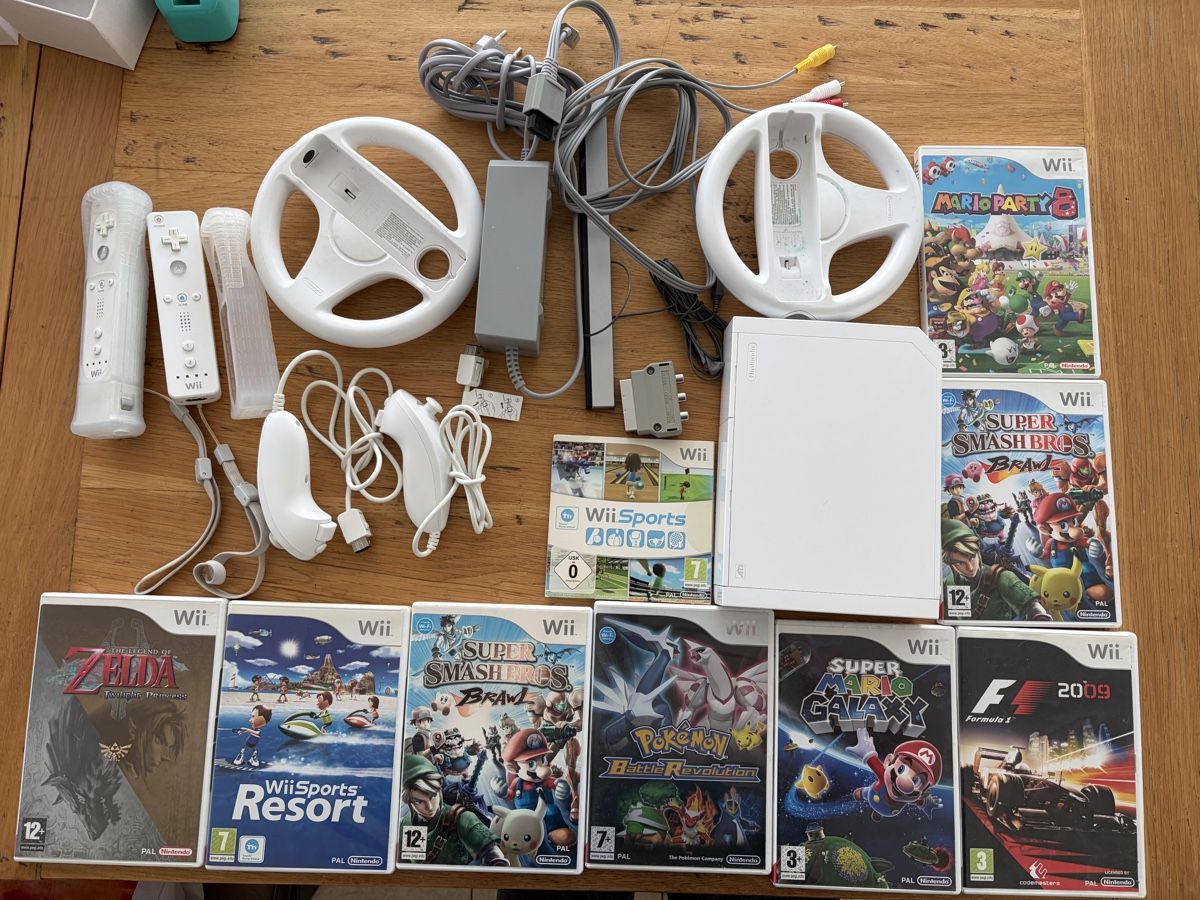 Nintendo Console: Nintendo Wii avec 9 jeux – Usato da Echallens venduto da JAR69