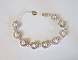 Armband mit Strasssteinen/Wachsperlen
