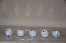 5 Golfbälle