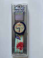 Pop Swatch Green case, sunburst dial, pink, purple, yellow