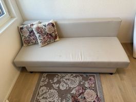Sofa bed with mattress topper