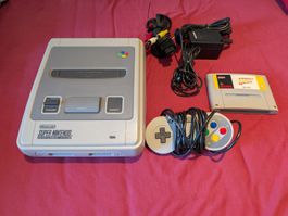 Super Nintendo, une manette, un jeu