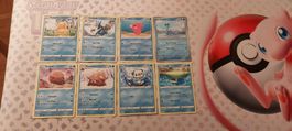 8 englische Pokemon Karten Psyduck Swinub Lapras Oshawott