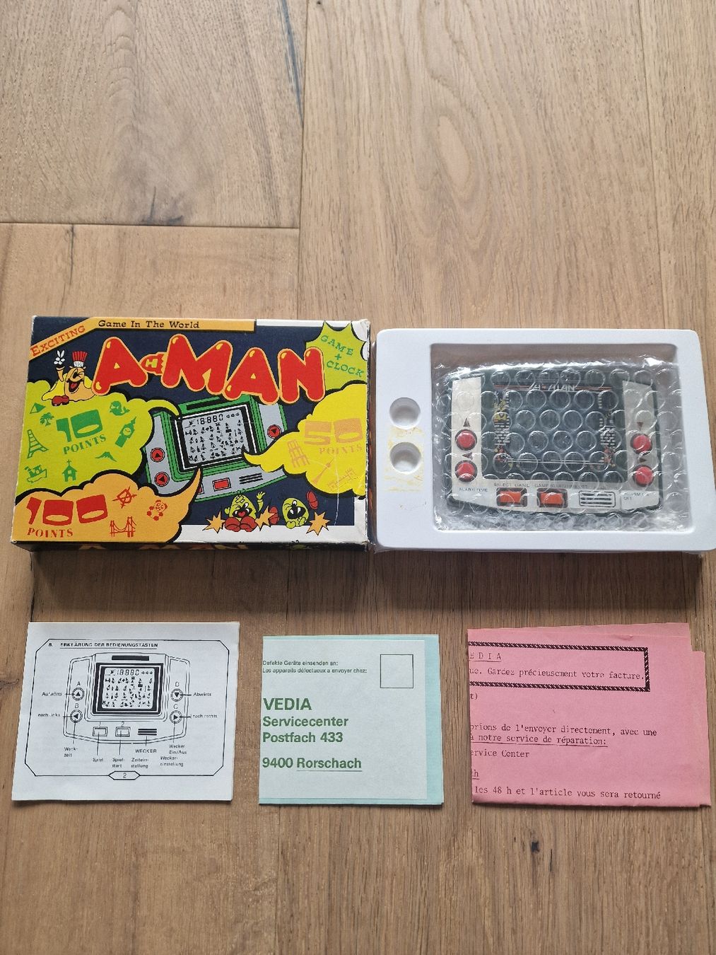 Konsolen: A-Man (PacMan) LCD Handheld Game + Clock mit Box & Anleitung – Gebraucht aus Fahrwangen von luk_bhw7
