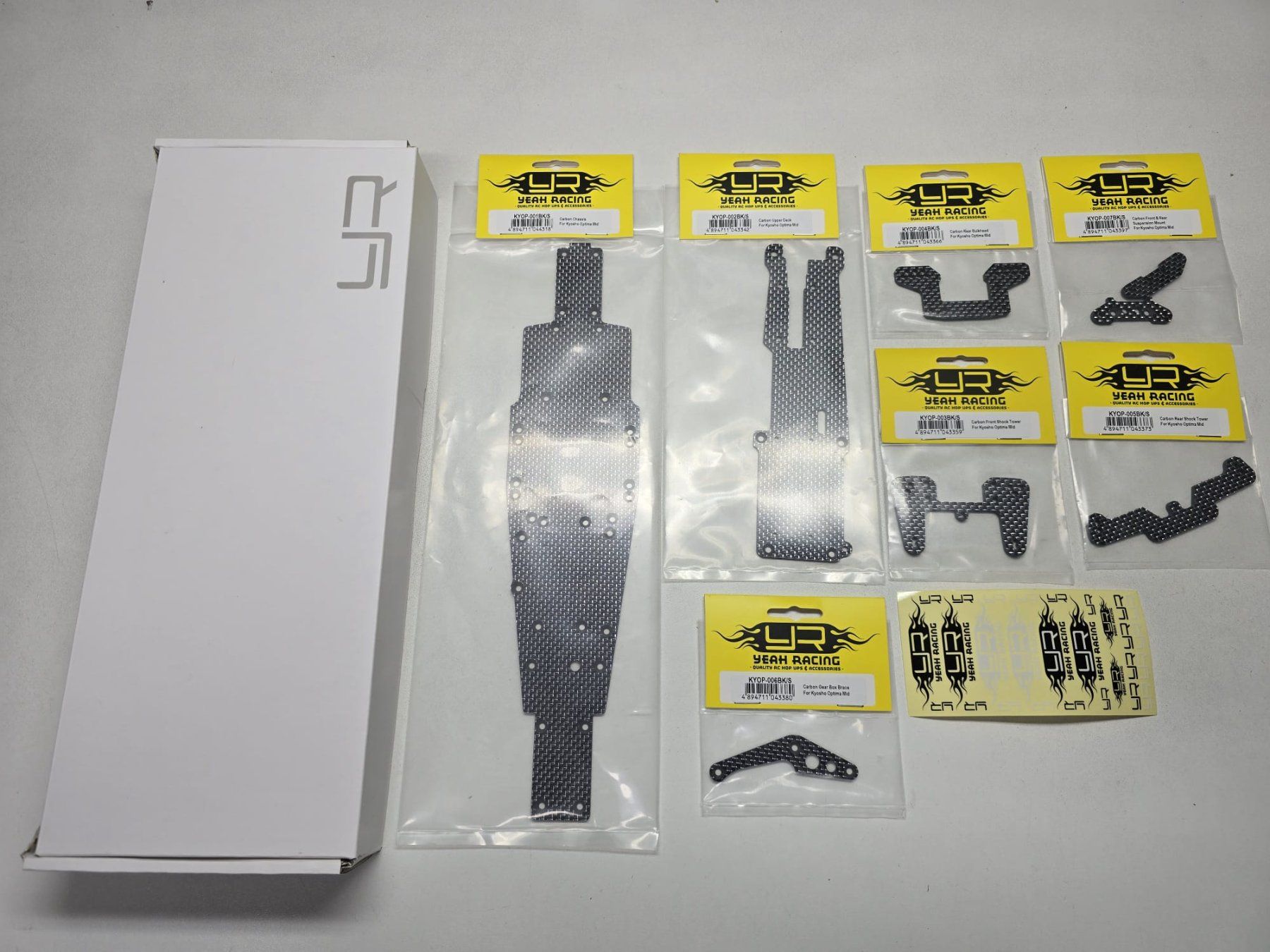 Kyosho Modellismo RC: Yeah Racing Carbon Upgrade Set x Kyosho Optima Mid – Nuovo (secondo la descrizione) da Oetwil am See venduto da diablo67