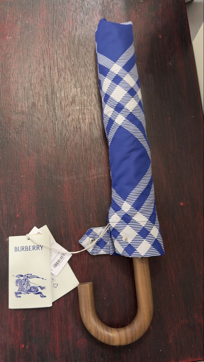 Burberry Ombrelli: Burberry Schirm, blau/weiss kariert – Nuovo e nell'imballaggio originale da Lachen SZ venduto da HelvetiaLuxury