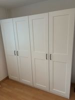 White 4-Door PAX Wardrobe with Handles - Great for Spring Cl