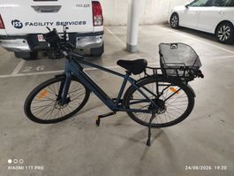 Vélo de ville avec moteur électrique.Ventara