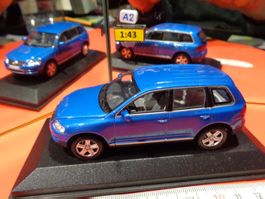 Volkswage Tuarec 1:43 (mit Box) Mini-Champs  > (A2)