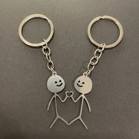 NEU: Schlüsselanhänger 2stk Figur mit Herz Metall