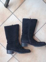 Superbes bottes d'hiver à talons en cuir fourrées taille 39