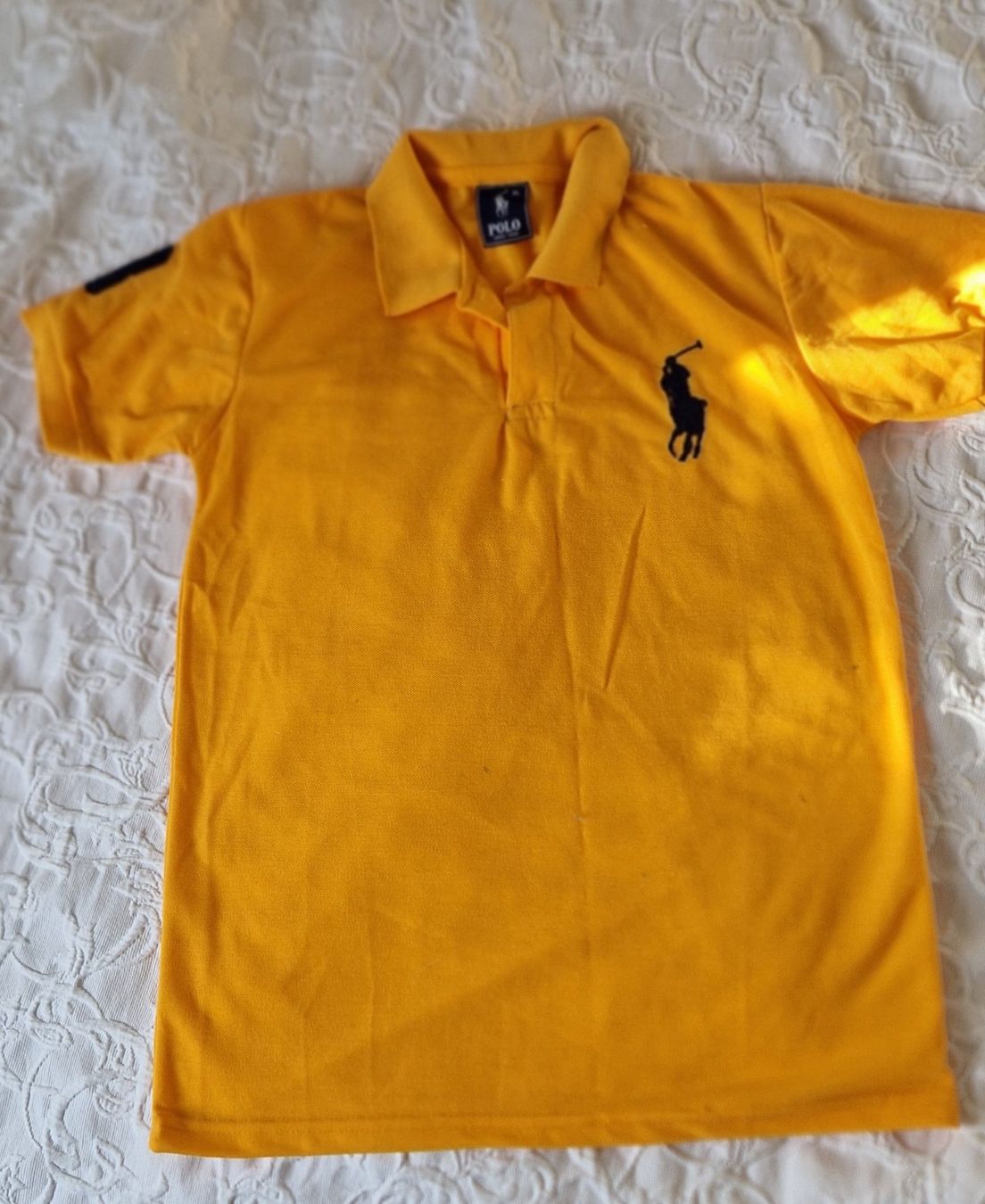 Hemden, T-Shirts & Polos: Polo garçon orange – Gebraucht aus Epalinges von Ozili