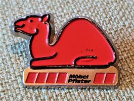 D019 - Pin Kamel Möbel Pfister Basel