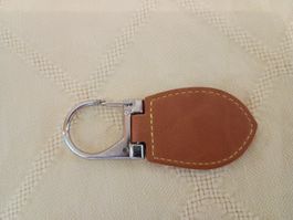 Schlüsselanhänger beige, oval, Karabiner, Leder, ca. 10 cm