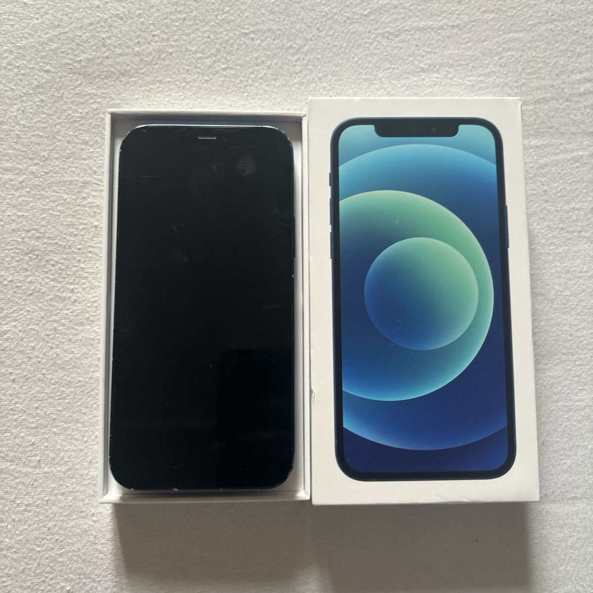 Apple Handys / Smartphones: iPhone 12 blue. – Gebraucht aus Undervelier von  1