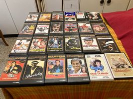Collection VHS et DVD + journaux Jean-Paul Belmondo