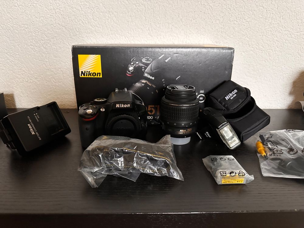 Nikon D5100 kit + 1855 + Nikon SB400 Flash Kaufen auf Ricardo