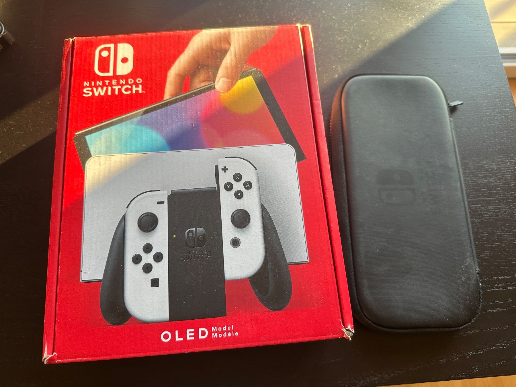 Nintendo Console: Nintentdo Switch Oled + Case + SD Card – Usato da Zürich venduto da martpie