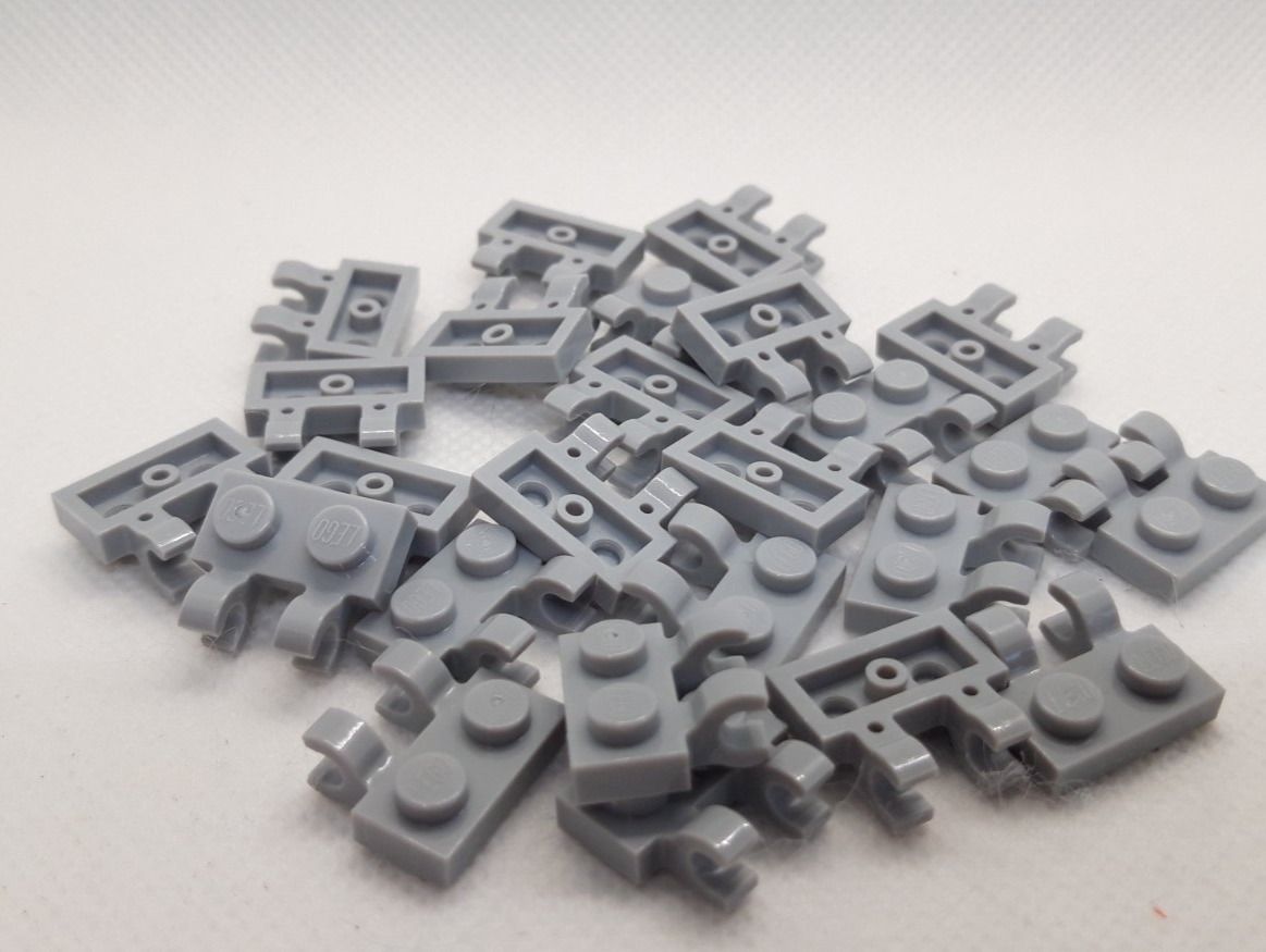 Lego Spielzeuge: Lego 25 Stk. Plate 1x2 w/holder, vertical – Neu (gemäss Beschreibung) aus Inwil von Dokyiioto
