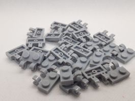 Lego 25 Stk. Plate 1x2 w/holder, vertical