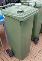 Poubelle verte à roulettes, capacité 140L, état neuf