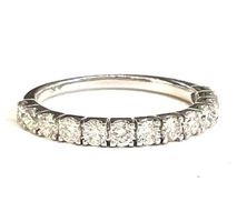 Alliancering: Weissgold, 13 Brillanten, 0.58ct. G/SI, 1980.-