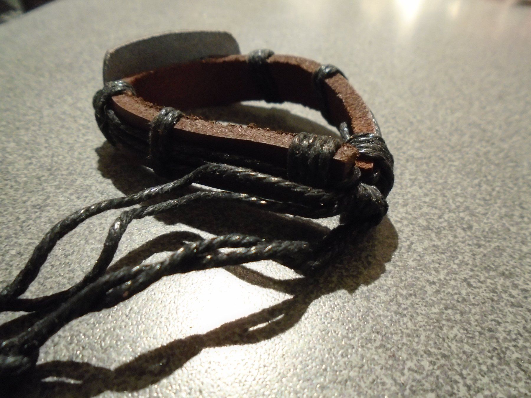 Bracciali & Braccialetti: Armband braun, farbiges Bild – Nuovo e nell'imballaggio originale da Zürich venduto da abraxas1291 1