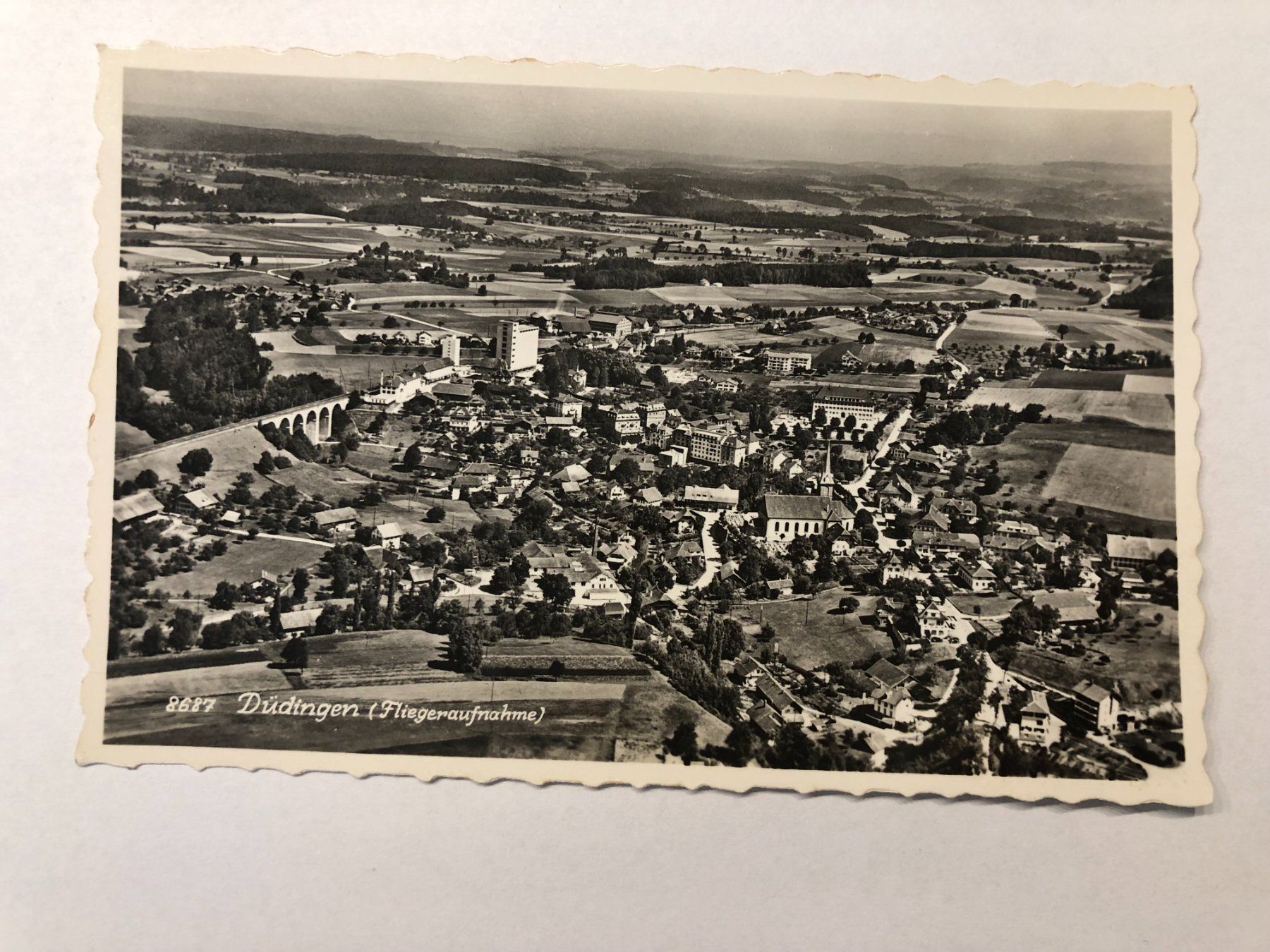Cartes postales: Ansichtskarte Düdingen Flugaufnahme – D'occasion à Pfäffikon ZH par Waltoversand