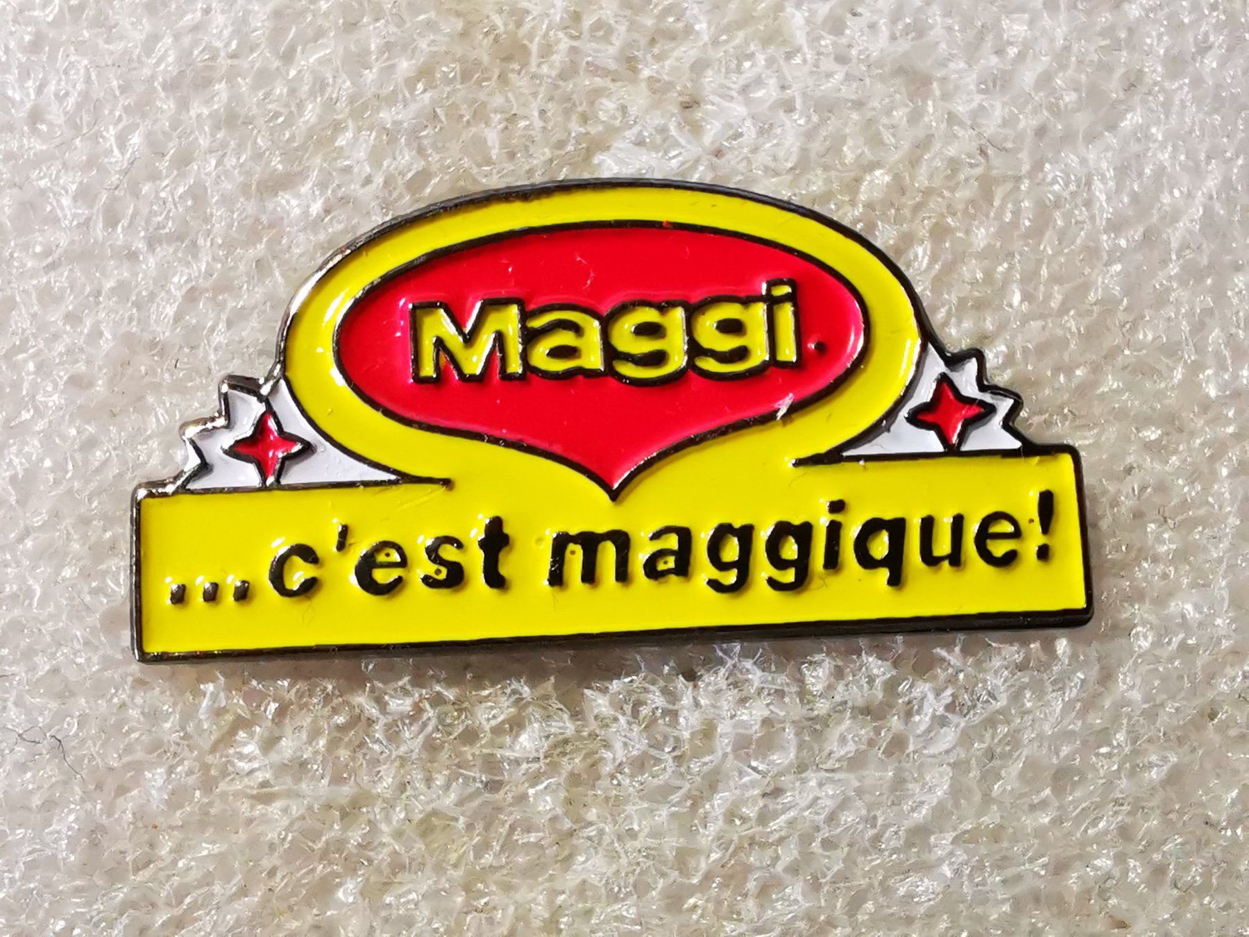 Plaketten & Abzeichen: Ansteckpin 87: Maggi – Gebraucht aus Oppligen von Pin-Fall-Shop