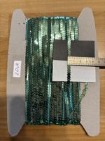 Textilband mit Pailletten
