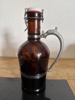 Loewenbraeu Zuerich Buegelflasche mit Zinngriff braun
