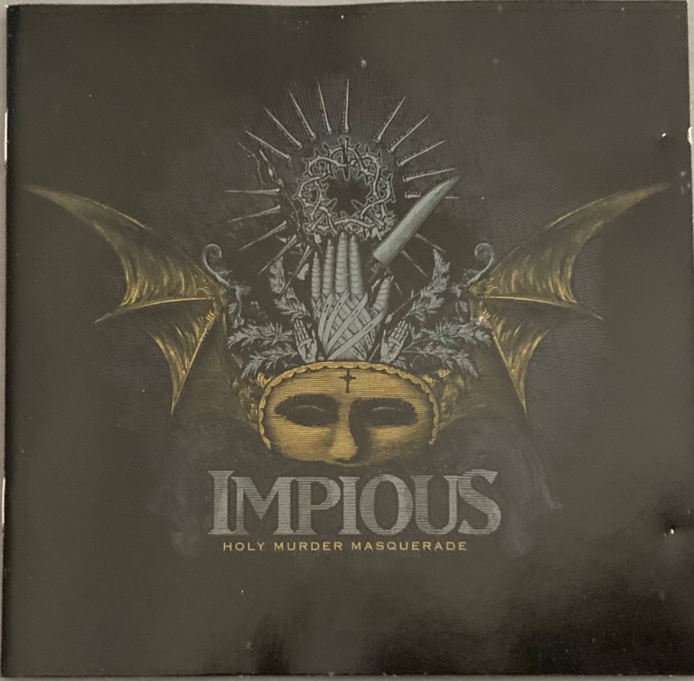 CD: IMPIOUS - HOLY MURDER MASQUERADE – Usato da Poliez-Pittet venduto da Newtown-Records
